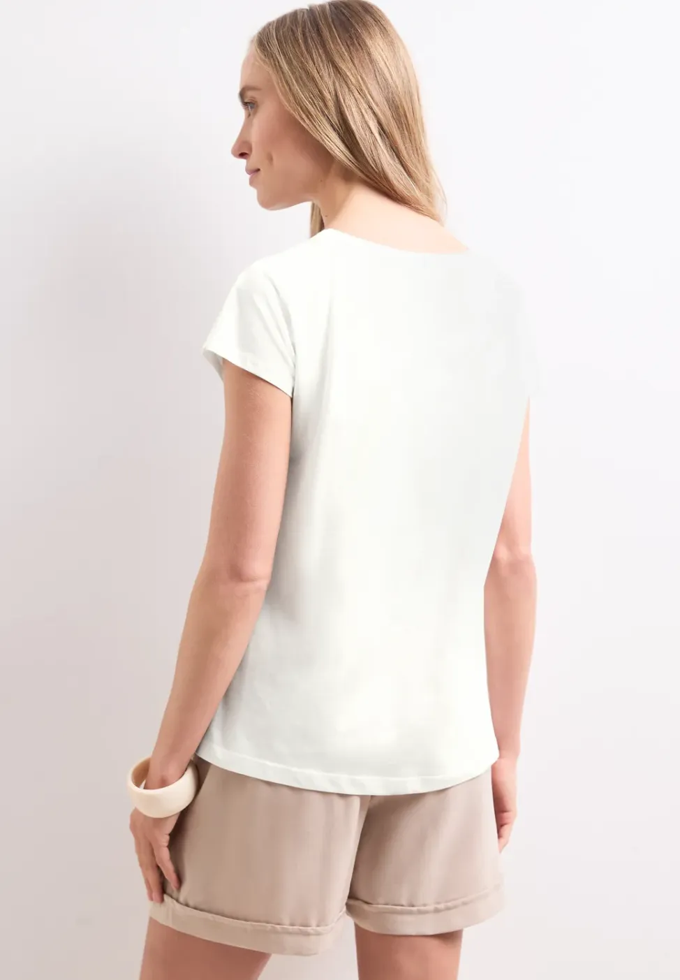 Shirt met hangende schouder en tekst
