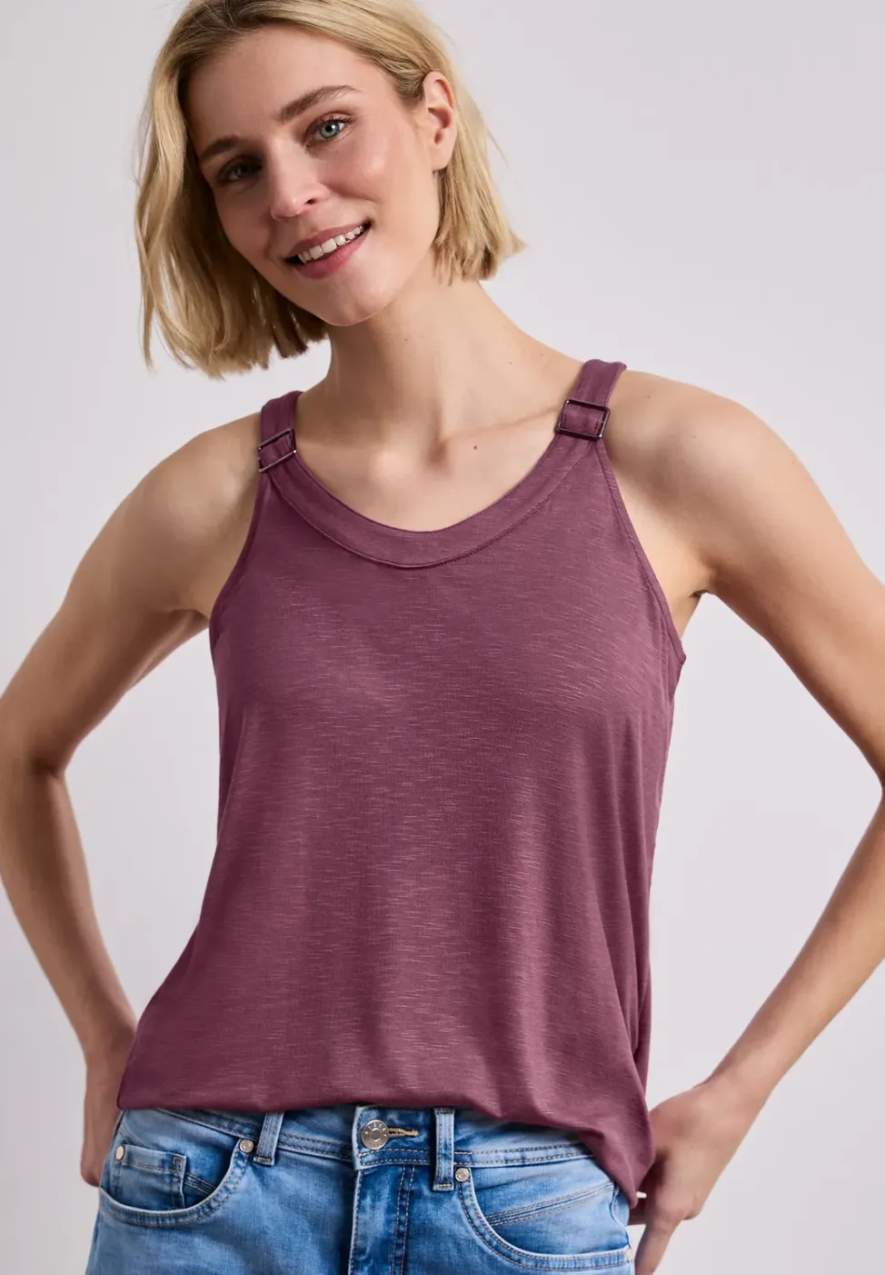 Top met V-hals en decoratief detail